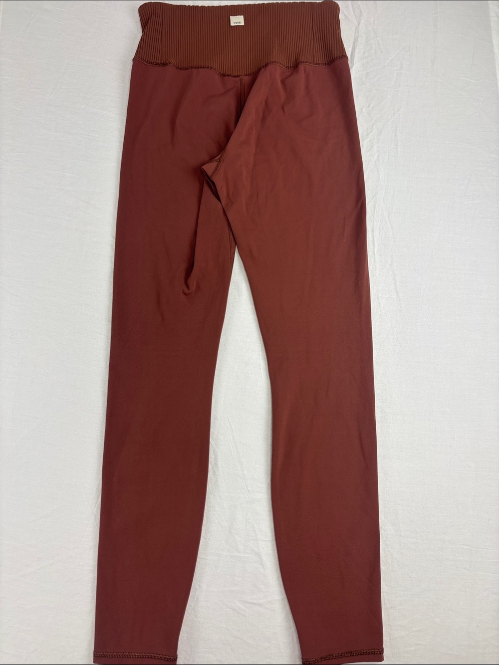 Women’s Vuori High-Rise Rib Studio Leggings in terracotta color